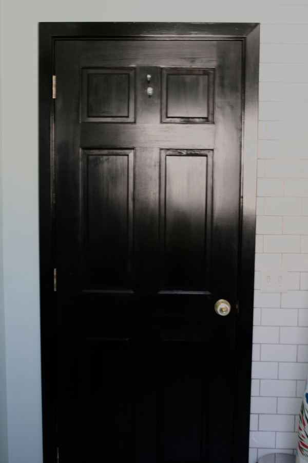 glossy black bathroom door